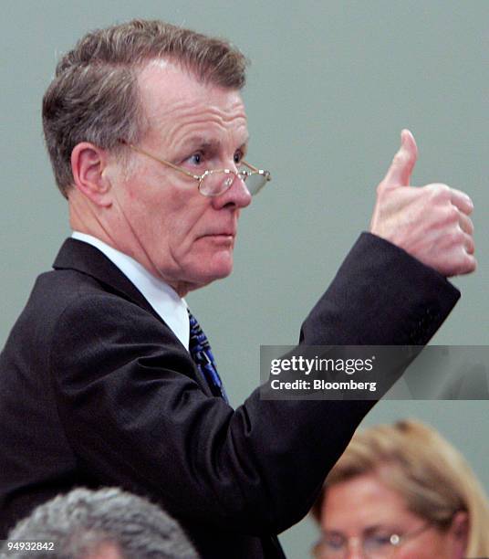 Illinois House Speaker Michael Madigan gestures during a meeting of the Illinois House Special Investigative Committee to consider the impeachment of...