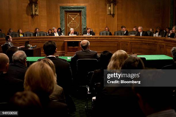 Herb Allison, assistant Treasury secretary for financial stability, center, testifies before a hearing of the Senate Banking Committee on the...