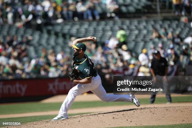 Chris Hatcher of the Oakland Athletics pitches during the game against the Los Angeles Angels of Anaheim at the Oakland Alameda Coliseum on April 1,...