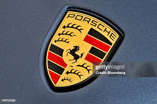 The Porsche emblem is displayed on the hood of a 2010 Porsche Panamera Turbo at the Road America race course in Elkhart Lake, Wisconsin, U.S., on...