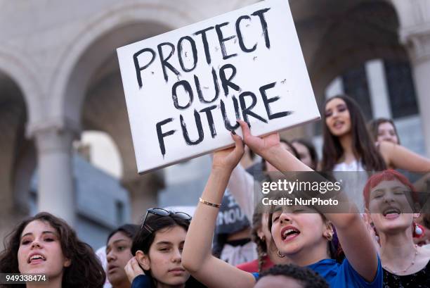 Students participate in a protest against gun violence during the National School Walkout in Los Angeles, California on April 20, 2018. Students and...