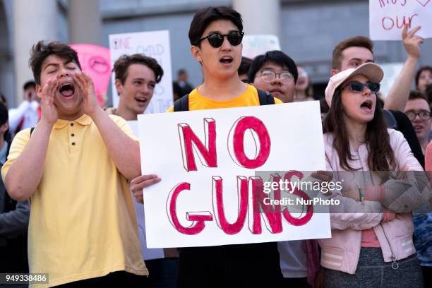 Students participate in a protest against gun violence during the National School Walkout in Los Angeles, California on April 20, 2018. Students and...