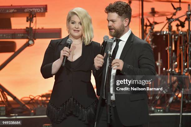 Kelly Osbourne and Jack Osbourne speak onstage at the 25th Annual Race To Erase MS Gala at The Beverly Hilton Hotel on April 20, 2018 in Beverly...