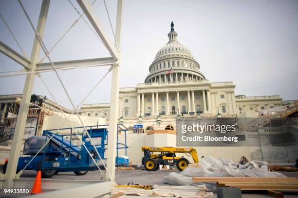 Construction continues on the platform being built on the west front of the U.S. Capitol in preparation for the inauguration ceremony of incoming...