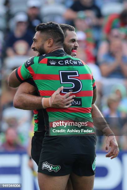 Greg Inglis of the Rabbitohs celebrates his try with team mates during the round seven NRL match between the South Sydney Rabbitohs and the Canberra...