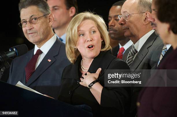 Representative Kirsten Gillibrand, center, speaks during a news conference following the announcement by New York Governor David Paterson, unseen,...