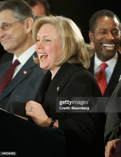 Representative Kirsten Gillibrand, center, speaks during a news conference following the announcement by New York Governor David Paterson, unseen,...