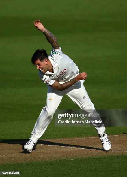 Jade Dernbach of Surrey bowls during day one of the Division One Specsavers County Championship match between Surrey and Hampshire at The Kia Oval on...