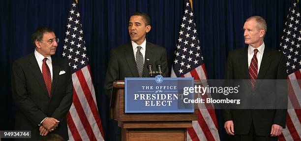 President-elect Barack Obama, center, is flanked by Leon Panetta, a former congressman and chief of staff to President Bill Clinton, left, and...