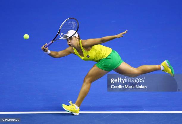 Ashleigh Barty of Australia plays a forehand in her match against Quirine Lemoine of the Netherlands during the World Group Play-Off Fed Cup tie...