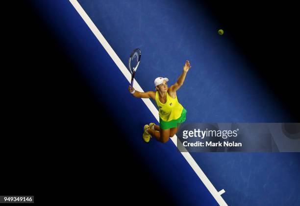 Ashleigh Barty of Australia serves in her match against Quirine Lemoine of the Netherlands during the World Group Play-Off Fed Cup tie between...