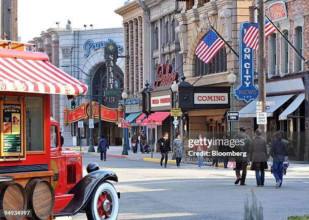 Visitors walk through the Universal Studios Japan theme park in Osaka, Japan, on Wednesday, Jan. 14, 2009. Goldman Sachs Group Inc. Fund plans to...