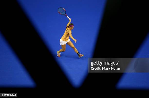 Quirine Lemoine of the Netherlands plays a forehand in her match against Ashleigh Barty of Australia during the World Group Play-Off Fed Cup tie...