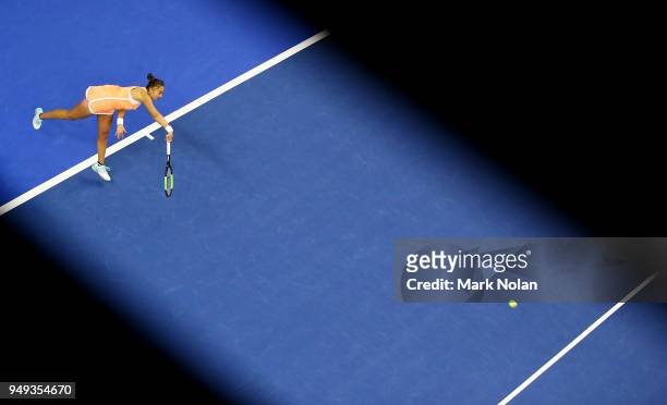Lesley Kerkhove of the Netherlands serves in her match against Samantha Stosur of Australia during the World Group Play-Off Fed Cup tie between...
