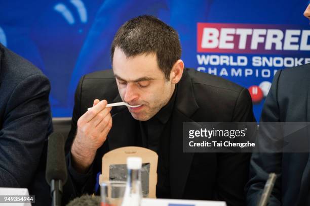 Ronnie O'Sullivan of England eats a salad during a media day ahead of 2018 World Snooker Championship at Crucible Theatre on April 20, 2018 in...