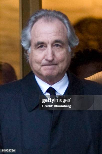 Bernard Madoff, president and founder of Bernard L. Mandoff Investment Securities LLC, walks out of Manhattan federal court in New York, U.S., on...