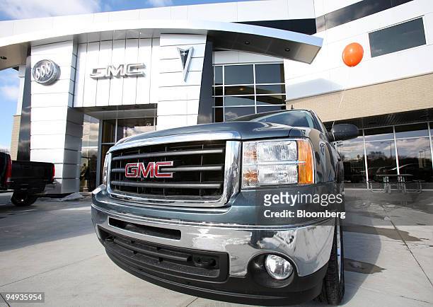 Truck sits on display at the Fresard Buick Pontiac GMC dealership in Ferndale, Michigan, U.S., on Saturday, Jan. 24, 2009. General Motors Corp., Ford...