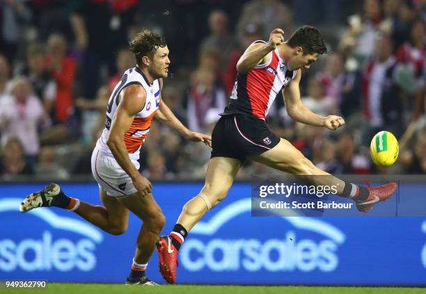 Jade Gresham of the Saints kicks a behind in the final minutes to draw the game during the round five AFL match between the St Kilda Saints and the...