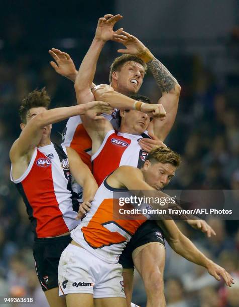 Aidan Corr of the Giants spolis Jake Carlisle of the Saints during the round five AFL match between the St Kilda Saints and the Greater Western...