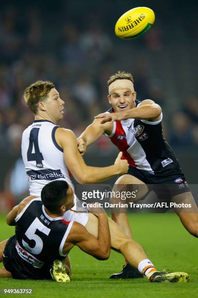 Toby Greene of the Giants handballs during the round five AFL match between the St Kilda Saints and the Greater Western Sydney Giants at Etihad...