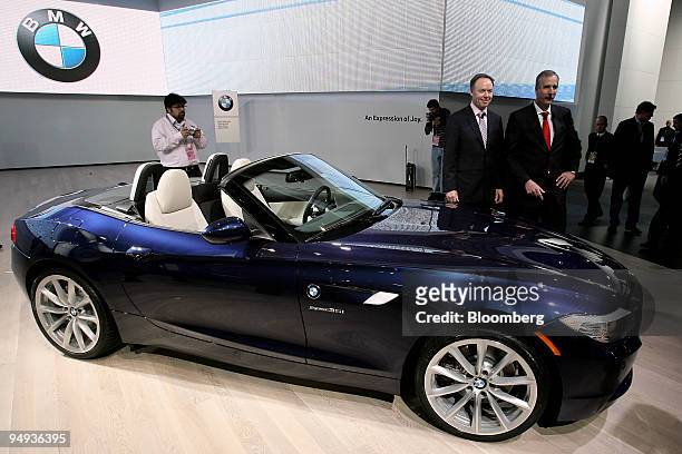 Ian Robertson, sales chief for Bayerische Motoren Werke AG, second from the right, and Klaus Draeger, head of development, stand with the new BMW Z4...