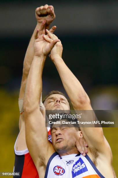 Nathan Brown of the Saints spoils Jonathon Patton of the Giants during the round five AFL match between the St Kilda Saints and the Greater Western...