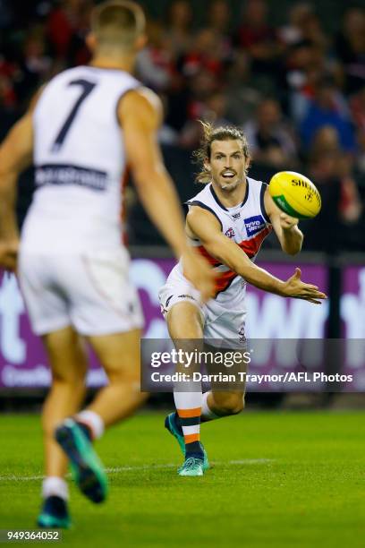 Phil Davis of the Giants handballs during the round five AFL match between the St Kilda Saints and the Greater Western Sydney Giants at Etihad...