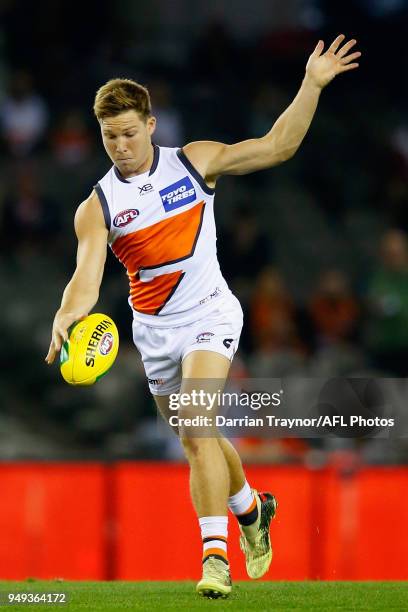 Toby Greene of the Giants handballs during the round five AFL match between the St Kilda Saints and the Greater Western Sydney Giants at Etihad...