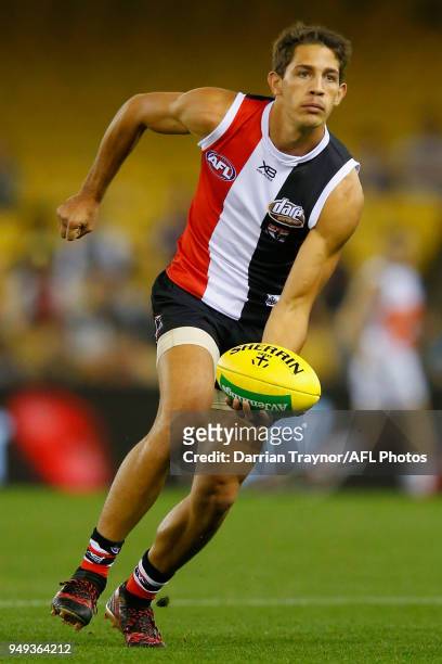 Ben Long of the Saints handballs during the round five AFL match between the St Kilda Saints and the Greater Western Sydney Giants at Etihad Stadium...