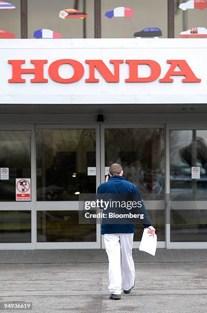 Honda worker walks through the Honda car production plant in Swindon, U.K., on Friday, Jan. 30, 2009. Honda Motor Co., Japan?s second-largest...