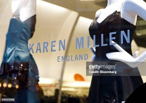 Mannequins seen on display in a shop window of a Karen Millen clothing store in Richmond, London, U.K., on Monday, Jan. 12, 2009. Retail sales had...