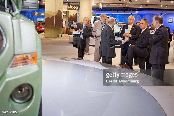 General Motors Corp. Executives, from left, Gary Cowger, head of manufacturing and labor, Thomas Stephens, vice president of global powertrain,...
