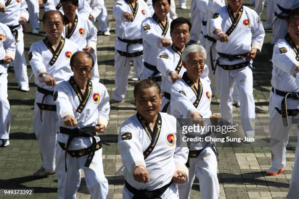 About 10,000 South Koreans perform martial arts Taekwondo at the national assembly on April 21, 2018 in Seoul, South Korea. The event organized by a...