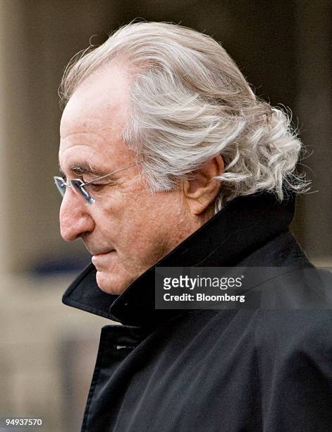 Bernard Madoff, founder of Bernard L. Madoff Investment Securities LLC, leaves federal court after a bail hearing in New York, U.S., on Wednesday,...