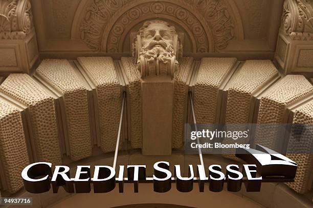 The Credit Suisse Group AG logo hangs at the company's headquarters on Paradeplatz in Zurich, Switzerland, on Saturday, Feb. 7, 2009. Credit Suisse...