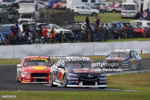 Jamie Whincup drives the Red Bull Holden Racing Team Holden Commodore ZB leads Scott McLaughlin drives the Shell V-Power Racing Team Ford Falcon FGX...