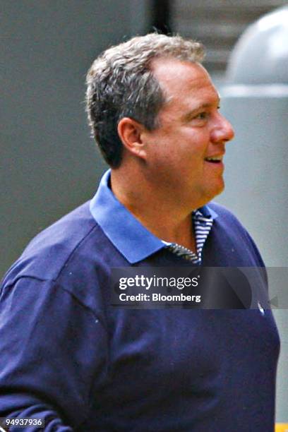 Robert Wolf, chairman of the Americas at UBS AG, center, arrives at the Federal Reserve Bank of New York, in New York, U.S., on Sunday, Sept. 14,...