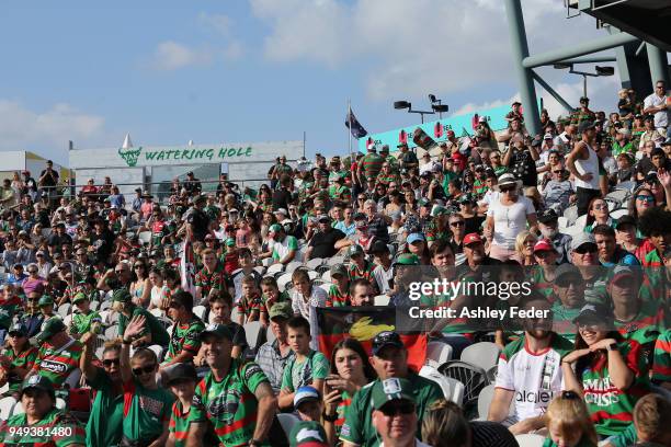 Rabbitohs fans support their team during the round seven NRL match between the South Sydney Rabbitohs and the Canberra Raiders at Central Coast...