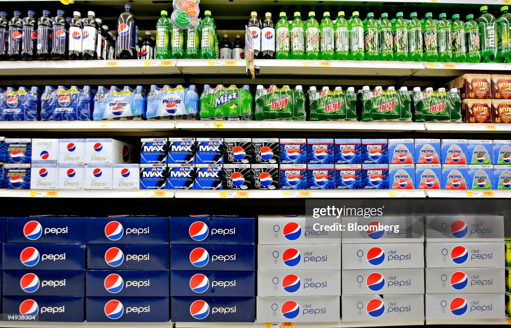 Cases of Pepsi soft drinks sit on a Smiths Food & Drug store