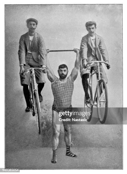 strong man lifting man on bicycle over his head - strongman stock illustrations