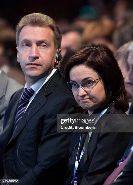 Igor Shuvalov, Russia's first deputy prime mInister, left, and Elvira Nabiullina, Russia's economy minister, listen during the third day of the St....