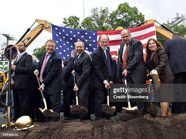 Officials including, left to right, Anthony Coscia, chairman of the NY/NJ Port Authority, Peter Rogoff, administrator of the U.S. Federal...