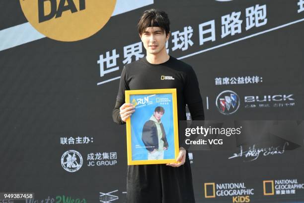 Actor Gao Weiguang attends National Geographic Earth Day Run 2018 on April 21, 2018 in Shanghai, China.