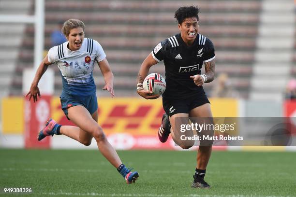 Gayle Broughton of New Zealand makes a break on day one of the HSBC Women's Rugby Sevens Kitakyushu Pool match between New Zealand and France at...