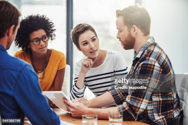 staying right on track with regular staff meetings - mapodile stock pictures, royalty-free photos & images