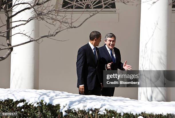 President Barack Obama, left, walks with Gordon Brown, U.K. Prime minister, along the Colonnade at the White House in Washington, D.C., U.S., on...