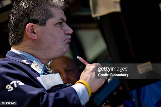 Floor official John Pann works on the floor of the New York Stock Exchange in New York, U.S., on Monday, April 13, 2009. U.S. Stocks fell, sending...