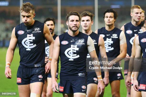 Dale Thomas of the Blues and Patrick Cripps of the Blues look dejected after defeat during the round five AFL match between the Carlton Blues and the...