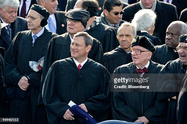 Supreme Court Justices, from left, Stephen G. Breyer, Anthony M. Kennedy, John Roberts, David Souter, John Paul Stevens, Clarence Thomas, and Antonin...