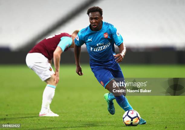 Tolaji Bola of Arsenal makes a run during the Premier League 2 match between West Ham United and Arsenal at London Stadium on April 20, 2018 in...